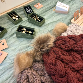 Jewellery and knitted hats on a stall