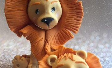 S Evans Lion Topper.jpg
