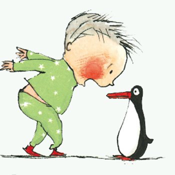 Boy in green top and trousers talking to a toy penguin