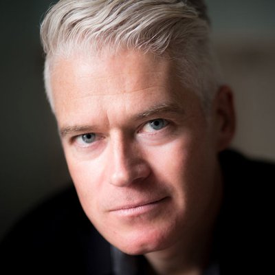 Colour photo of author T.M. Logan