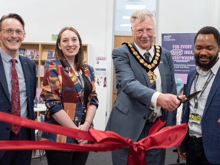 Chairman of County Council ribbon cutting at Beeston