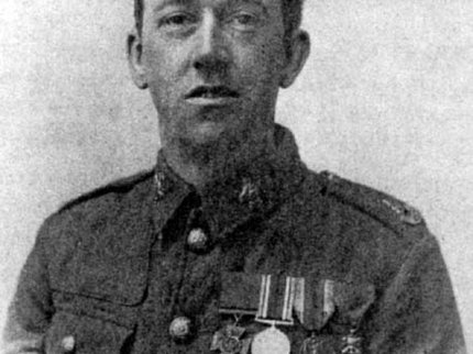 A black and white image of William Henry Johnson in uniform, wearing his medals including the Victoria Cross.