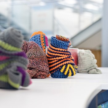 Wrapped scarves on display in the library