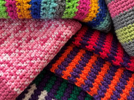 Multi coloured stripy scarves