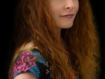 Photograph of Zoe Gilby looking towards the camera