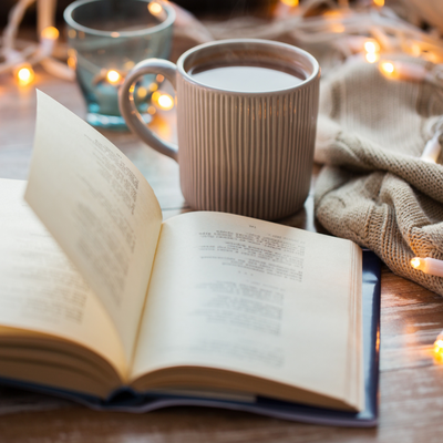 An open book and a cup of tea