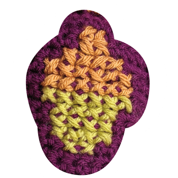 A cross stitch acorn motif for a Brave Bear