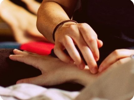 Persons hand demonstrating hand massage