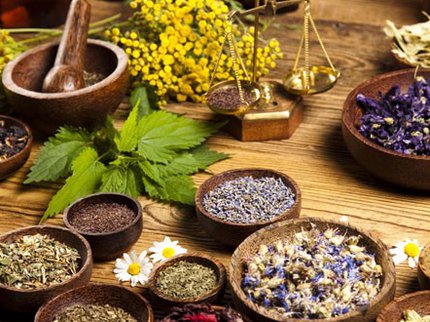 Bowls of herbs and flowers