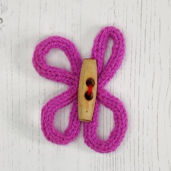 I-cord flower with a wooden toggle centre