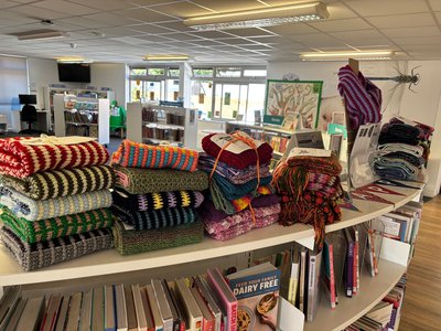 A wall of care squares colourful blankets