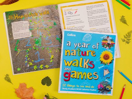 Two copies of the book 'a year of nature walks and games', one showing the closed book overlays a page spread title Hopscotch Walk.  Coloured pencils, leaves and flowers surround the books.