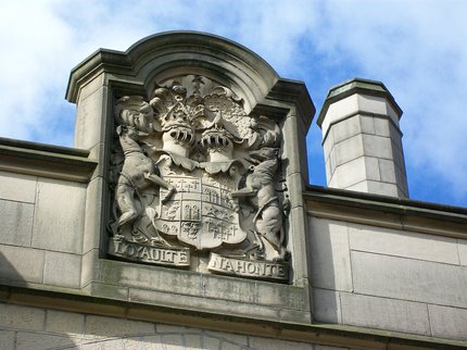 A crest on Nottingham Castle made from brown brick