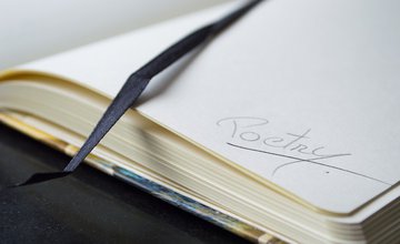 note book with the word Poetry written