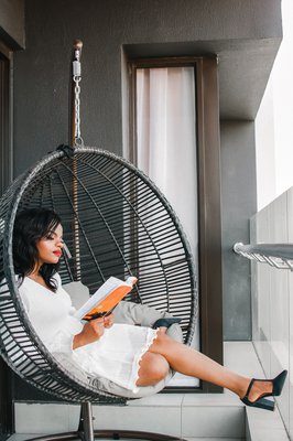 Woman reading in chair