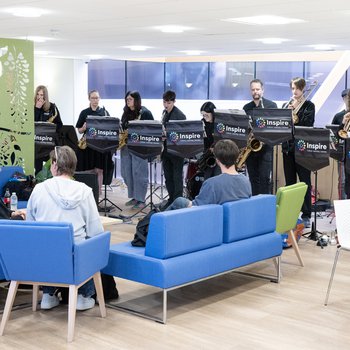Crowds sat enjoying 1940s inspired music by the Red Hot Band