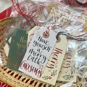 Gift tags with Christmas phrases on them