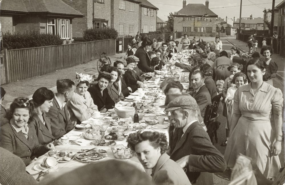 People enjoying a street party for VE Day in Farndon
