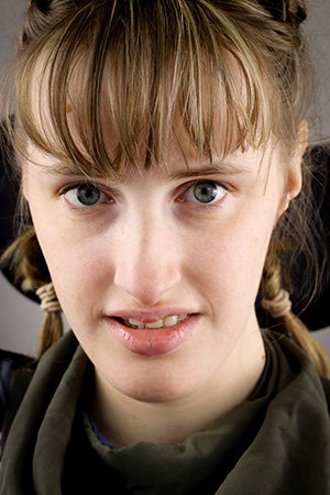 Close up headshot of female AO Pioneer, Zoe looking dorectly into the camera